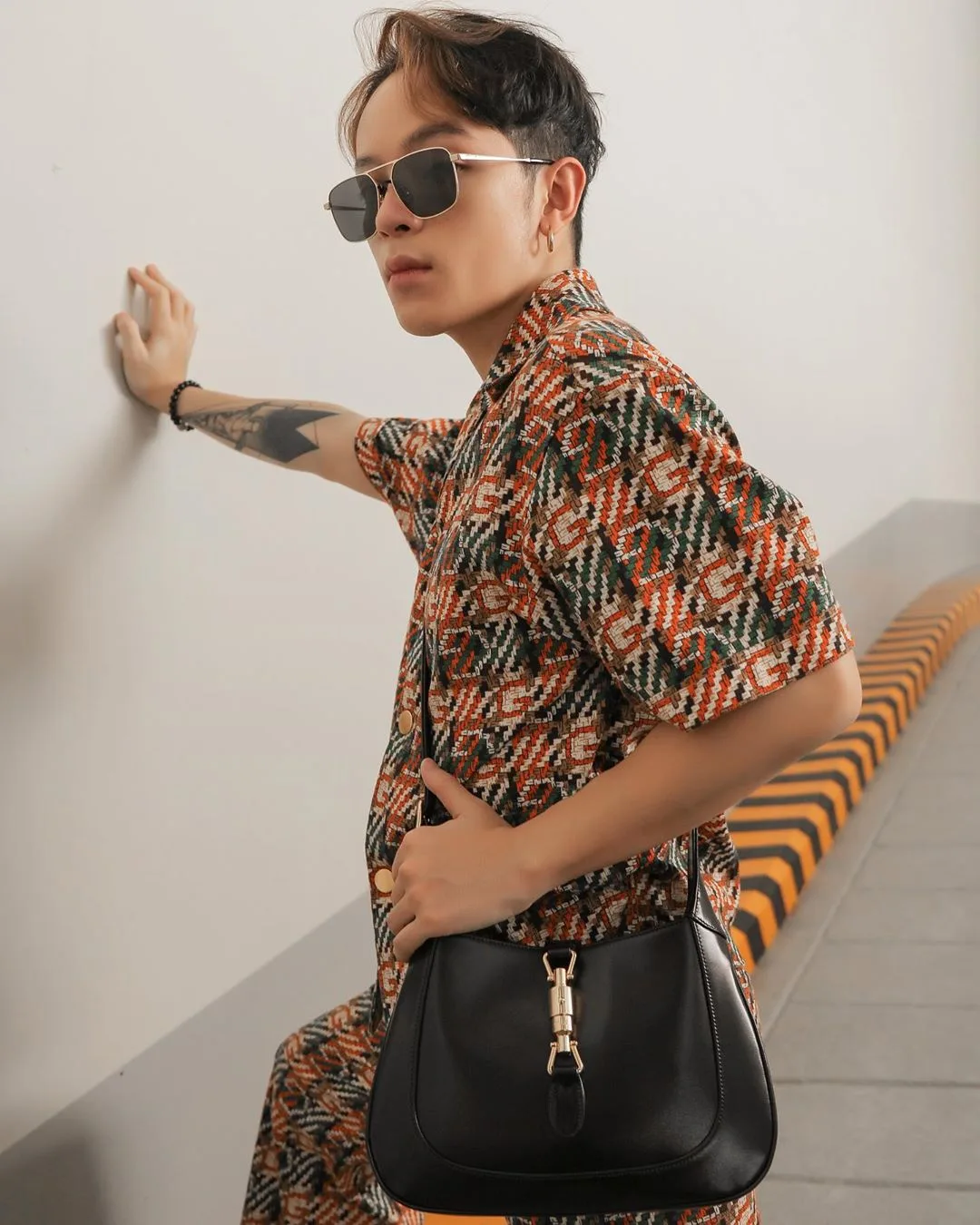 kelbin lei mặc gucci