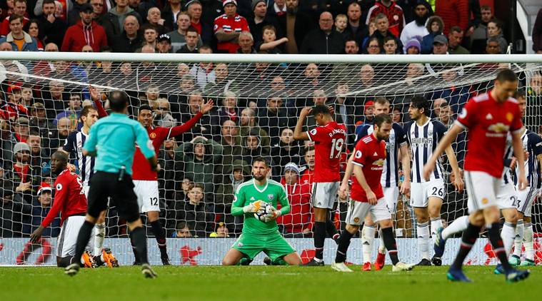 Soccer Football - Premier League - Manchester United vs West Bromwich Albion - Old Trafford, Manchester, Britain - April 15, 2018 West Bromwich Albion's Ben Foster hold the ball Action Images via Reuters/Jason Cairnduff EDITORIAL USE ONLY. No use with unauthorized audio, video, data, fixture lists, club/league logos or "live" services. Online in-match use limited to 75 images, no video emulation. No use in betting, games or single club/league/player publications. Please contact your account representative for further details.