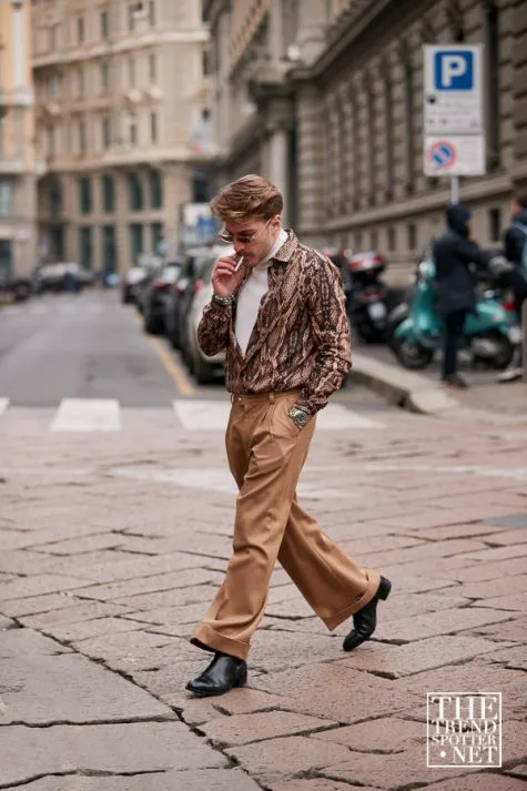 Phối áo da rắn với quần oversize, giày âu, mắt kính cùng mái tóc bồng bềnh khiến fashionisto này trông như một gã lãng tử của năm 90s.Ảnh: The Trend Spotter