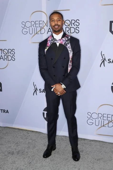Michael B Jordan với phần layer áo yếm độc đáo của Louis Vuitton. Ảnh: GQ