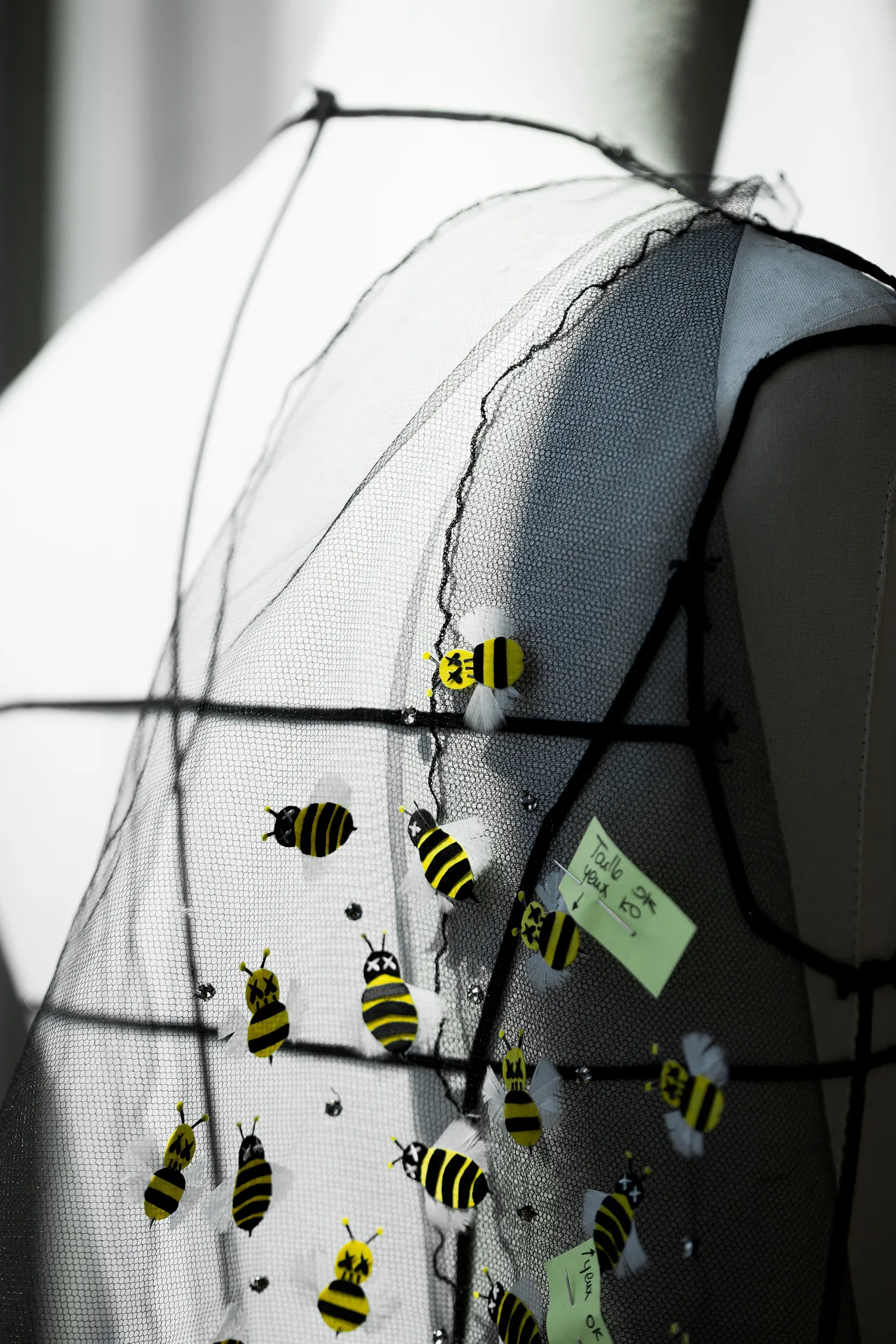 DiorÕs signature bee, redesigned by Kaws and embroidered at Maison Lemari.
