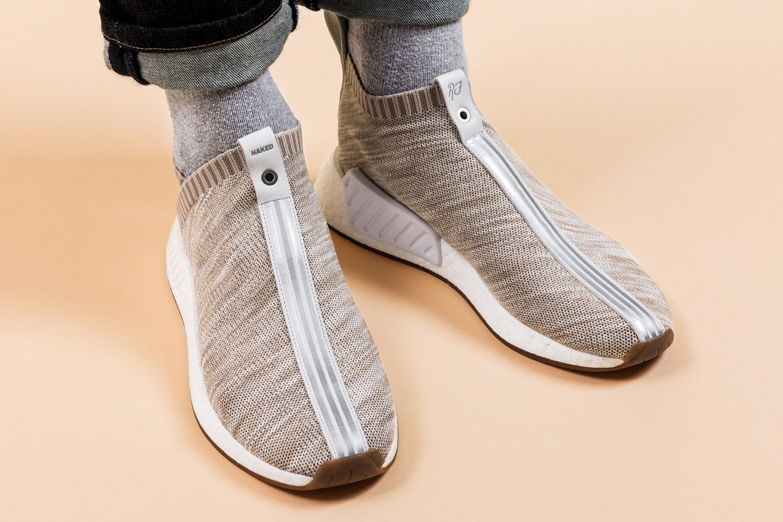 giay the thao adidas 2017 - Kith x Naked x adidas Consortium NMD City Sock - elle man 2